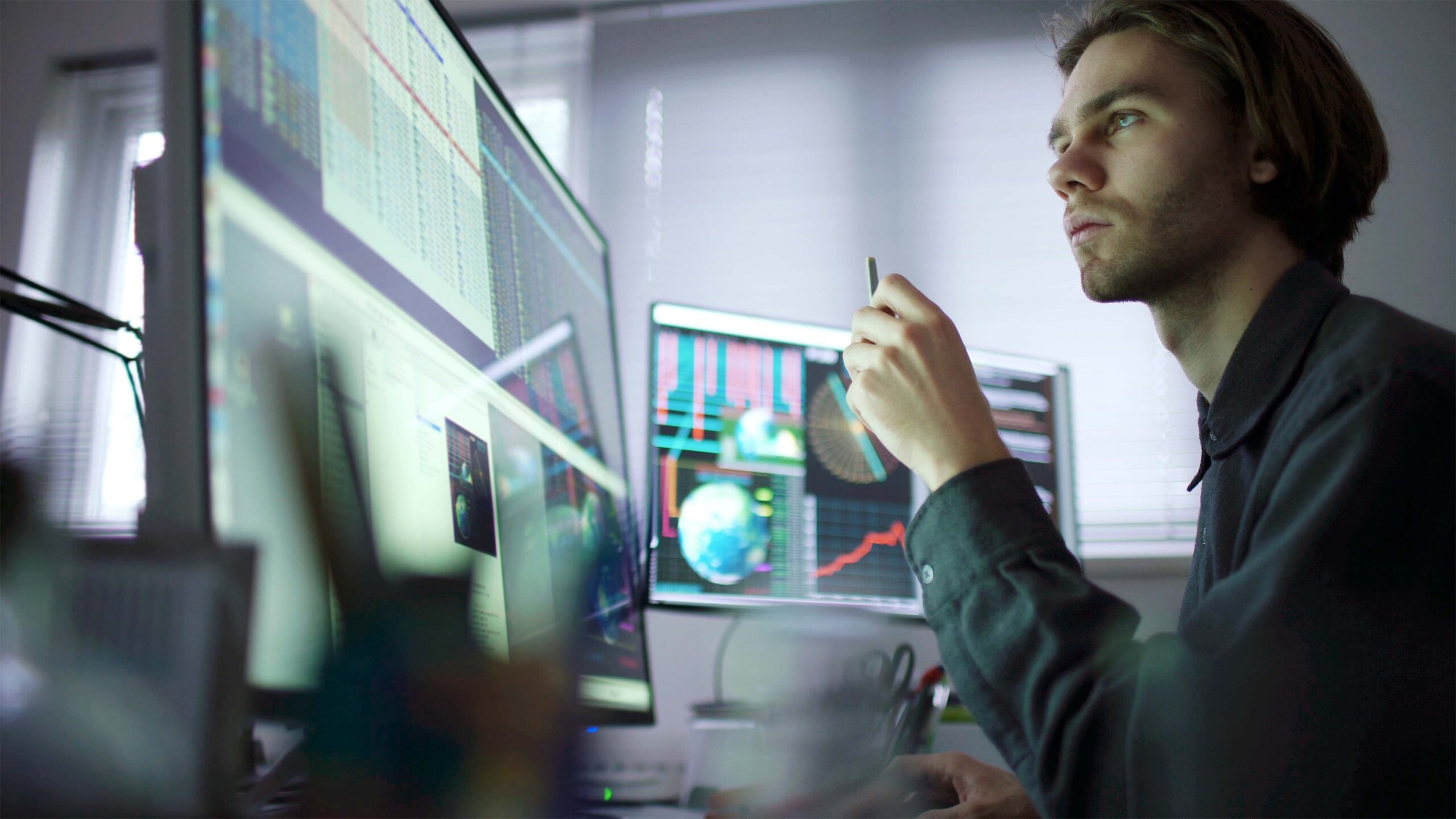 man at a computer performing a security assessment